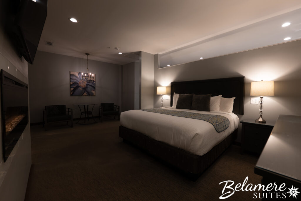 Grand Royal Pool Suite main bedroom at Belamere Suites.